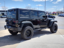 Thumbnail image of 2016 Jeep Wrangler Unlimited at Grand Blanc Mitsubishi