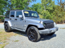 Thumbnail image of 2014 Jeep Wrangler Unlimited at Auto Mart Auto Sales