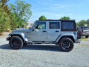 Thumbnail image of 2014 Jeep Wrangler Unlimited at Auto Mart Auto Sales
