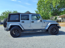 Thumbnail image of 2014 Jeep Wrangler Unlimited at Auto Mart Auto Sales