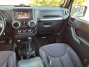 Thumbnail image of 2014 Jeep Wrangler Unlimited at Auto Mart Auto Sales