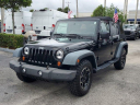 Thumbnail image of 2010 Jeep Wrangler Unlimited at DadelandDodgeChryslerJeepRam of Miami, FL