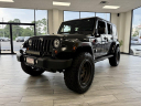 Thumbnail image of 2010 Jeep Wrangler Unlimited at DIXIE MOTORS INC.
