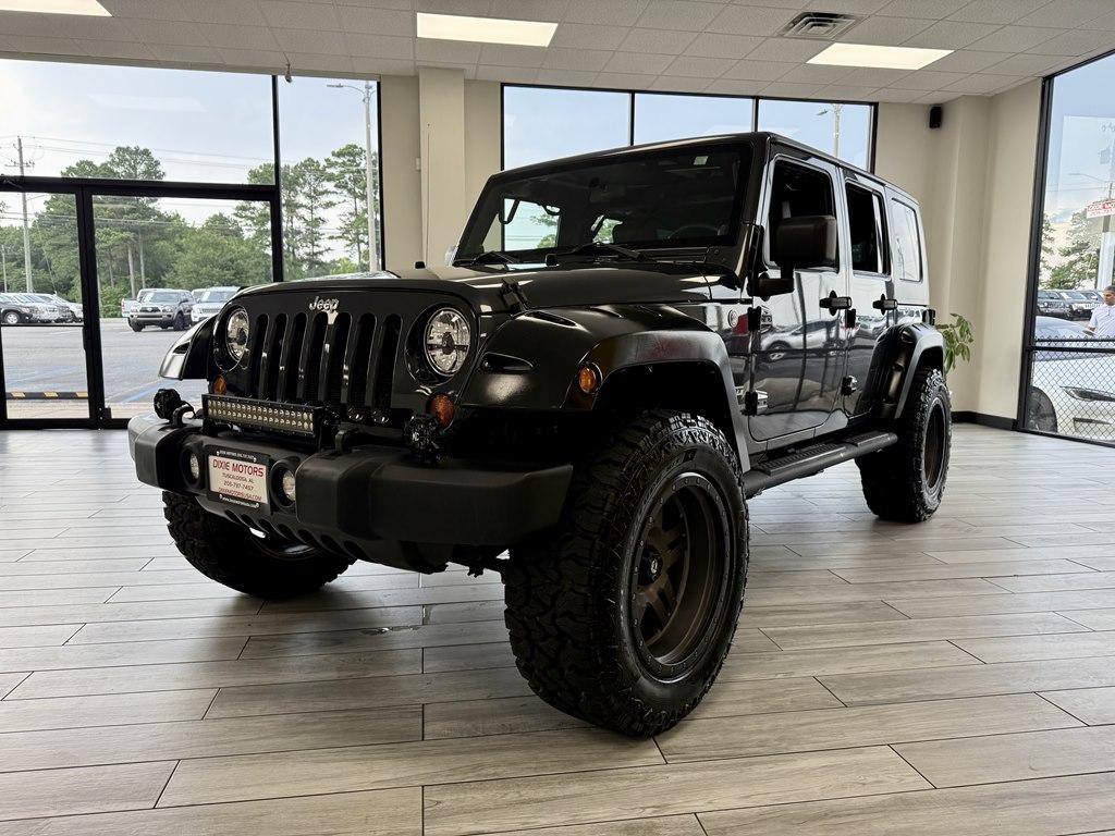 Thumbnail image of 2010 Jeep Wrangler Unlimited at DIXIE MOTORS INC.
