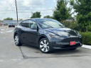 Thumbnail image of 2024 Tesla Model Y at Mike Calvert Toyota - New