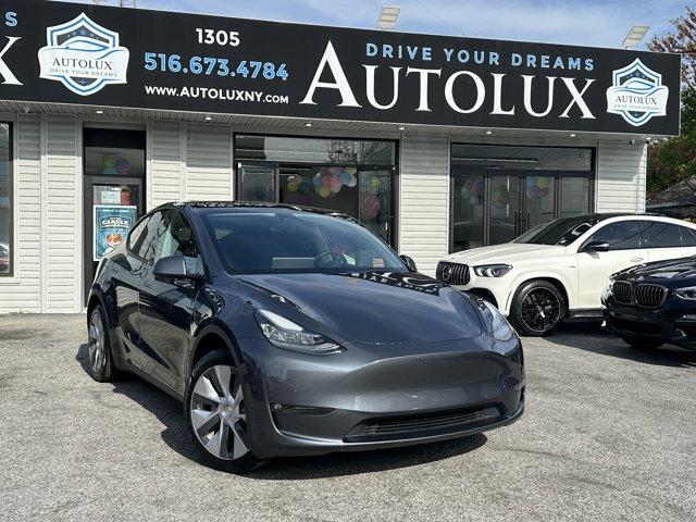 Thumbnail image of 2021 Tesla Model Y at Autolux of Elmont, NY