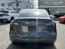 Thumbnail image of 2021 Tesla Model Y at Autolux of Elmont, NY