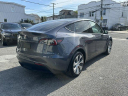 Thumbnail image of 2021 Tesla Model Y at Autolux of Elmont, NY