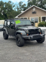 Thumbnail image of 2013 Jeep Wrangler Unlimited at CROWN MOTORS OF TALLAHASSEE, INC.