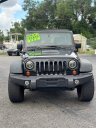 Thumbnail image of 2013 Jeep Wrangler Unlimited at CROWN MOTORS OF TALLAHASSEE, INC.