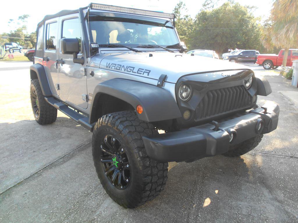 Thumbnail image of 2016 Jeep Wrangler Unlimited at Navarre Motors, Inc