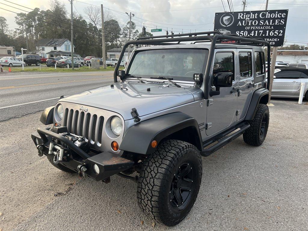 Thumbnail image of 2013 Jeep Wrangler Unlimited at Right Choice Auto Sales of Pensacola