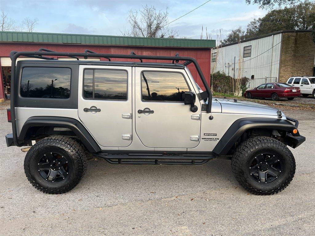 Thumbnail image of 2013 Jeep Wrangler Unlimited at Right Choice Auto Sales of Pensacola