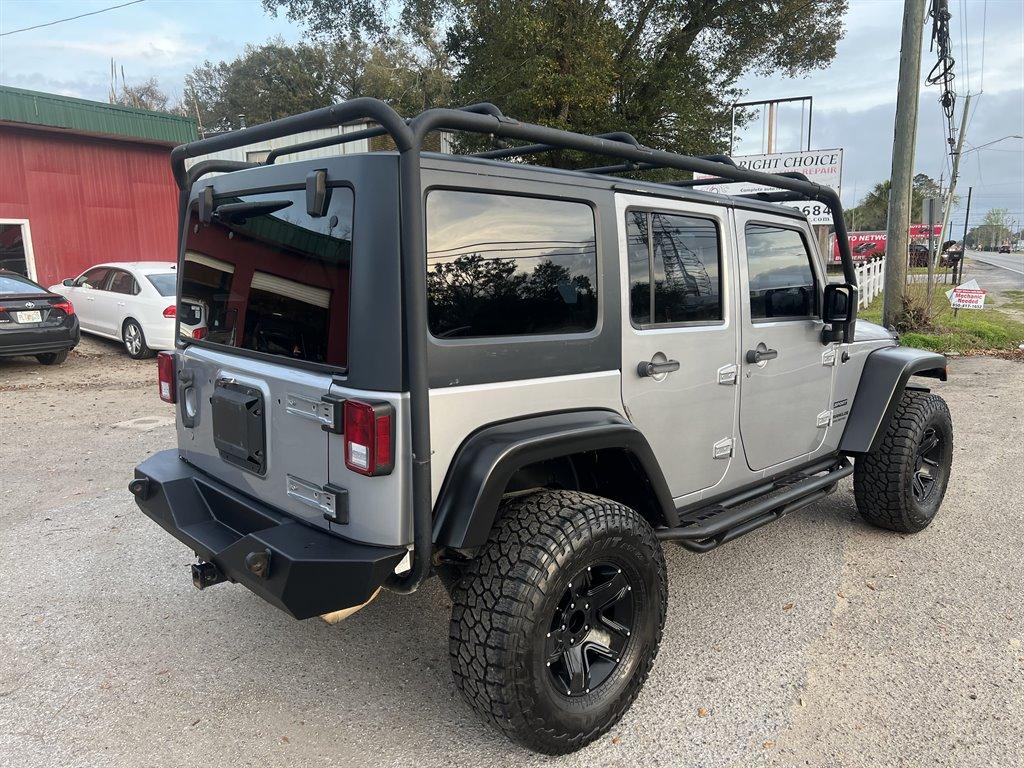 Thumbnail image of 2013 Jeep Wrangler Unlimited at Right Choice Auto Sales of Pensacola