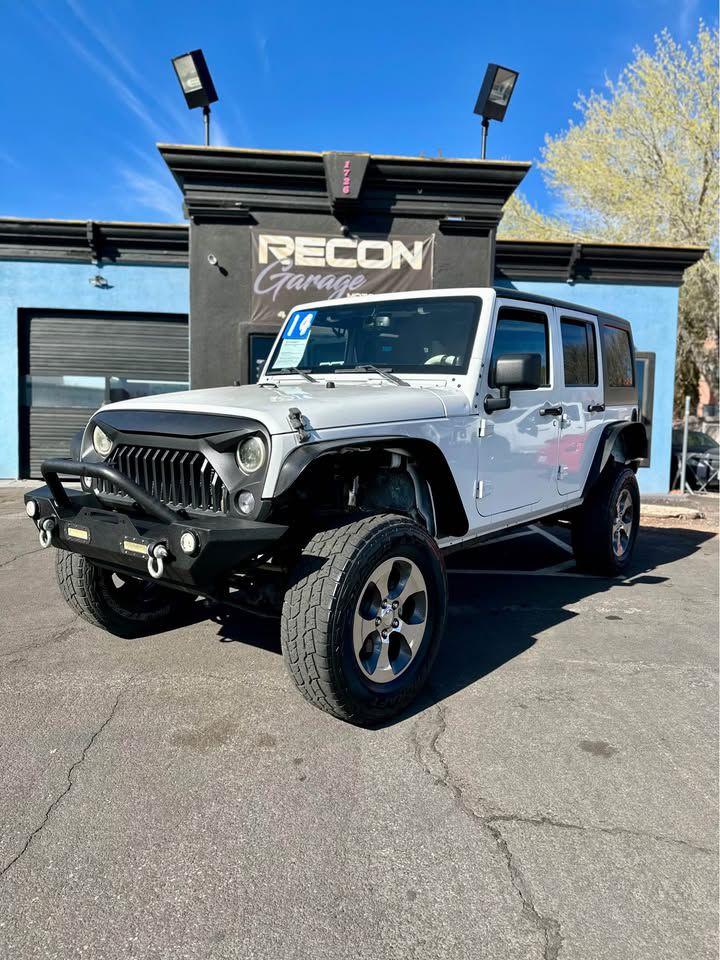 Thumbnail image of 2014 Jeep Wrangler Unlimited at RECON GARAGE MOTORSPORTS