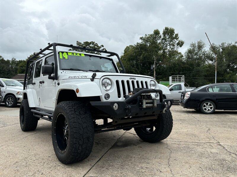 Thumbnail image of 2014 Jeep Wrangler Unlimited at Freedom Auto Sales