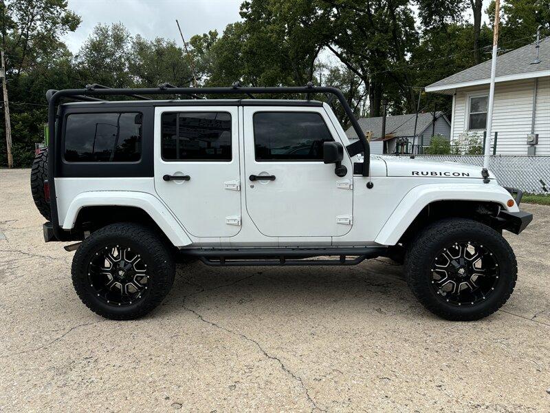 Thumbnail image of 2014 Jeep Wrangler Unlimited at Freedom Auto Sales