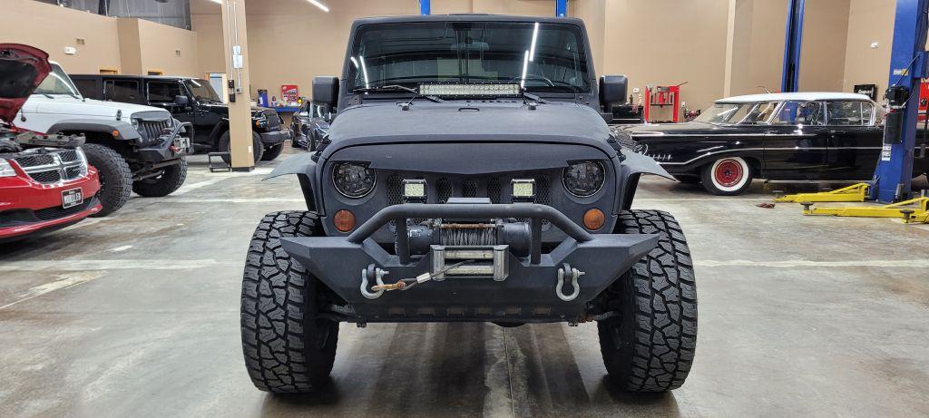 Thumbnail image of 2009 Jeep Wrangler Unlimited at MIDWEST MOTORS