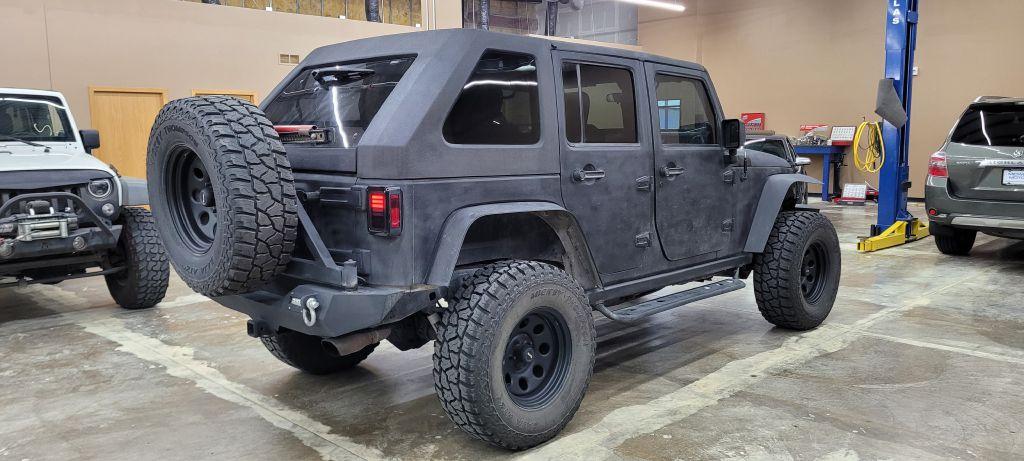 Thumbnail image of 2009 Jeep Wrangler Unlimited at MIDWEST MOTORS