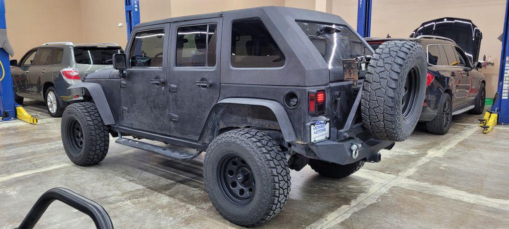 Thumbnail image of 2009 Jeep Wrangler Unlimited at MIDWEST MOTORS