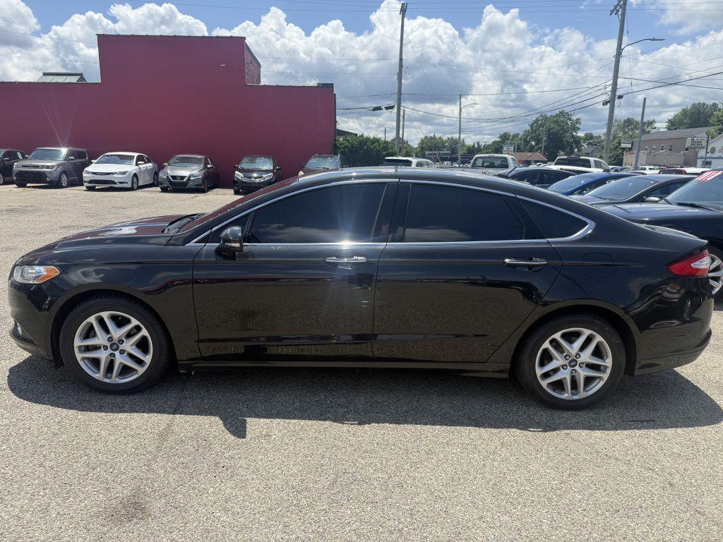 Thumbnail image of 2015 Ford Fusion at PREMIER AUTO MART INC