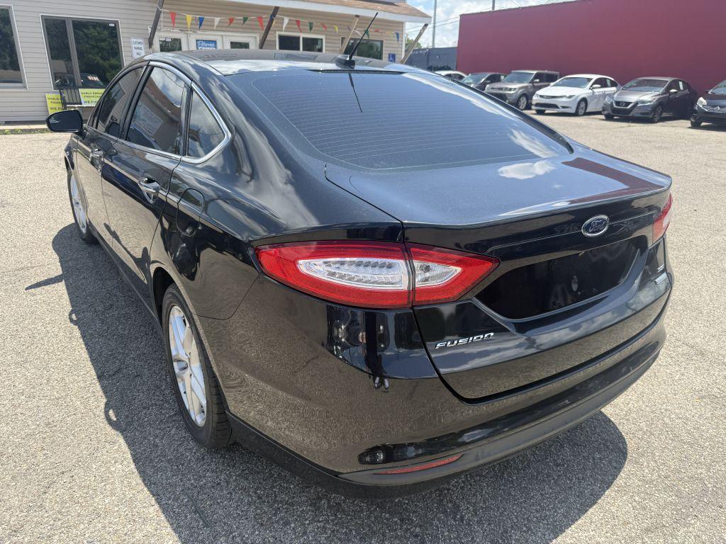 Thumbnail image of 2015 Ford Fusion at PREMIER AUTO MART INC