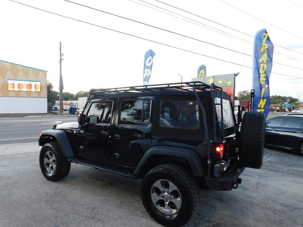 Thumbnail image of 2016 Jeep Wrangler Unlimited at FIVE STAR AUTO SALES of TAMPA