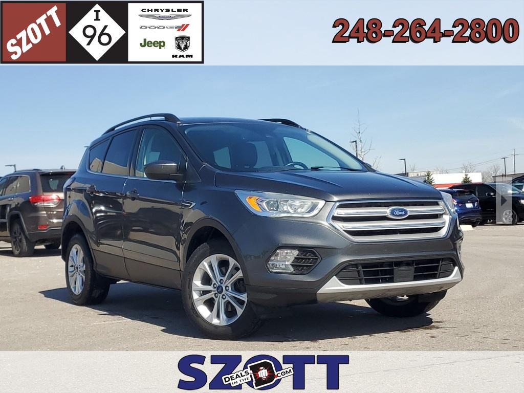Thumbnail image of 2018 Ford Escape at Szott I96 Chrysler Dodge Jeep Ram