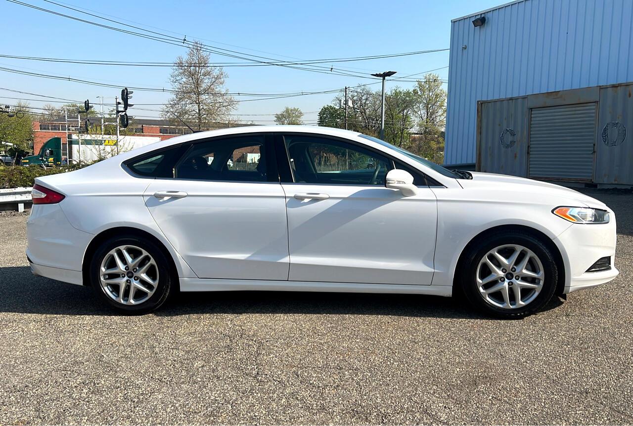 Thumbnail image of 2016 Ford Fusion at Cruz Autos Llc