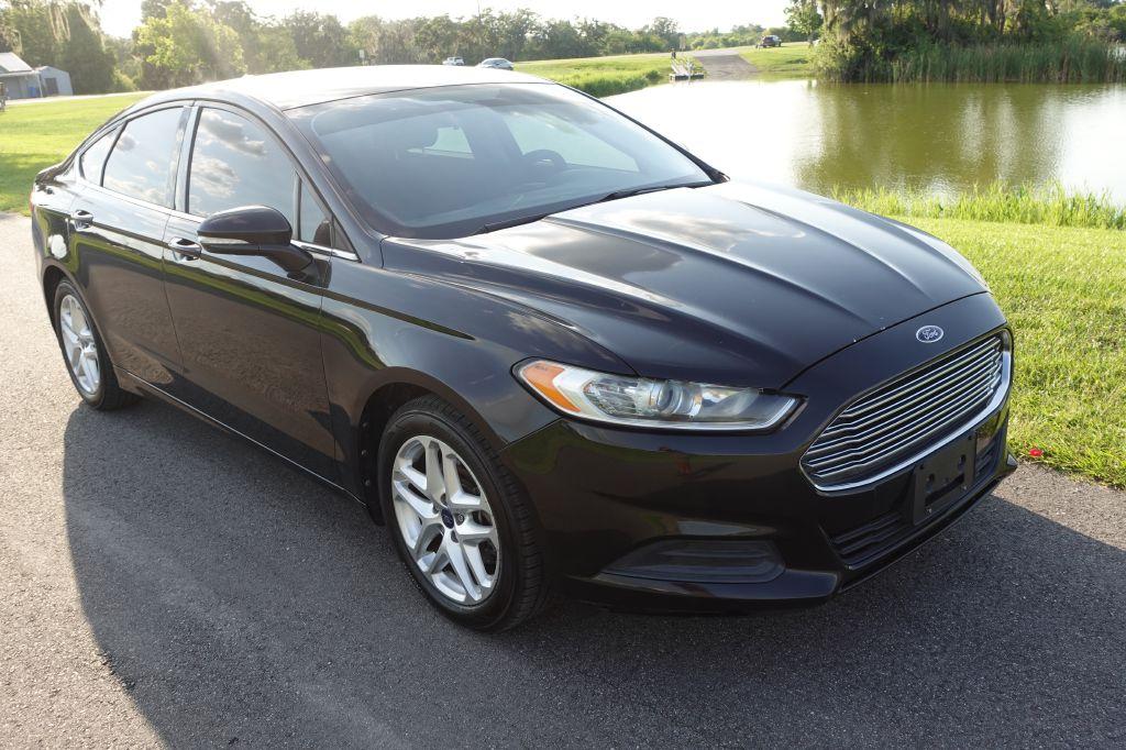 Thumbnail image of 2013 Ford Fusion at WARREN'S AUTO SALES, INC.