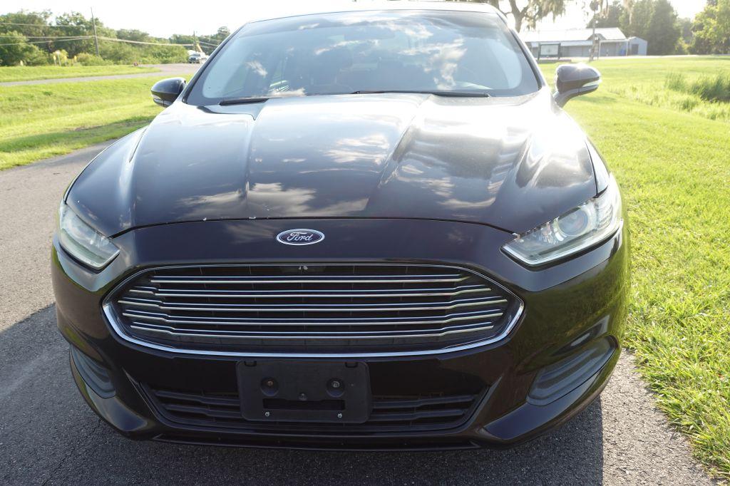 Thumbnail image of 2013 Ford Fusion at WARREN'S AUTO SALES, INC.