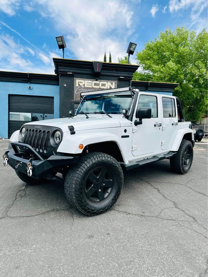 Thumbnail image of 2016 Jeep Wrangler Unlimited at RECON GARAGE MOTORSPORTS