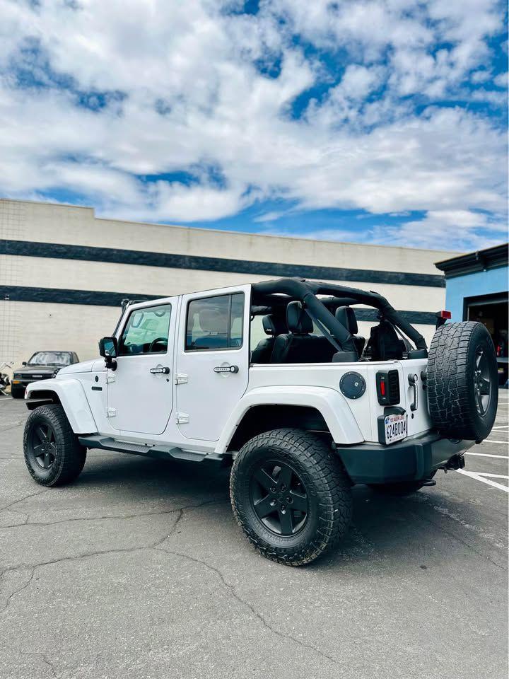 Thumbnail image of 2016 Jeep Wrangler Unlimited at RECON GARAGE MOTORSPORTS