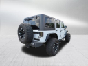 Thumbnail image of 2015 Jeep Wrangler Unlimited at SmithfieldPreownedDeaconJones of Selma, NC