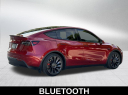 Thumbnail image of 2024 Tesla Model Y at Kendall Dodge Chrysler Jeep Ram