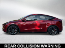 Thumbnail image of 2024 Tesla Model Y at Kendall Dodge Chrysler Jeep Ram