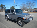 Thumbnail image of 2013 Jeep Wrangler Unlimited at WHOLESALERS UNLIMITED LLC