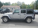 Thumbnail image of 2013 Jeep Wrangler Unlimited at WHOLESALERS UNLIMITED LLC