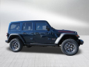 Thumbnail image of 2025 Jeep Wrangler at DeaconJonesCJDR-USED (DCERT filter)