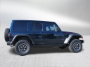 Thumbnail image of 2025 Jeep Wrangler at DeaconJonesCJDR-USED (DCERT filter)