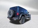 Thumbnail image of 2025 Jeep Wrangler at DeaconJonesCJDR-USED (DCERT filter)