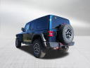 Thumbnail image of 2025 Jeep Wrangler at DeaconJonesCJDR-USED (DCERT filter)