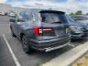 2021 Honda Pilot Touring w/Rear Captain's Chairs at LarryHMillerHonda-NEW of Murray, UT