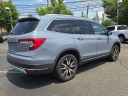 2022 Honda Pilot Touring w/Rear Captain's Chairs at MadisonHondaUSED of Madison, NJ