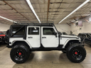 Thumbnail image of 2015 Jeep Wrangler Unlimited at North Port Motors