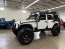 Thumbnail image of 2015 Jeep Wrangler Unlimited at North Port Motors