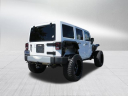 Thumbnail image of 2015 Jeep Wrangler Unlimited at SmithfieldPreownedDeaconJones of Selma, NC