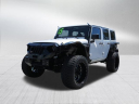 2015 Jeep Wrangler Unlimited Sahara at SmithfieldPreownedDeaconJones of Selma, NC