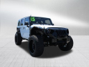 Thumbnail image of 2015 Jeep Wrangler Unlimited at SmithfieldPreownedDeaconJones of Selma, NC