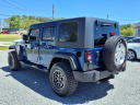 Thumbnail image of 2010 Jeep Wrangler Unlimited at Auto Mart Auto Sales